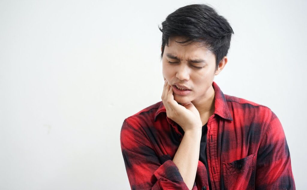 treat TMJ jaw pain with urgent dental care